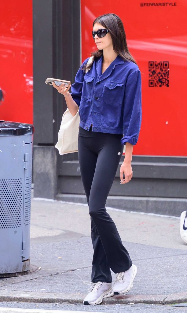 Kaia Gerber in a Blue Denim Jacket