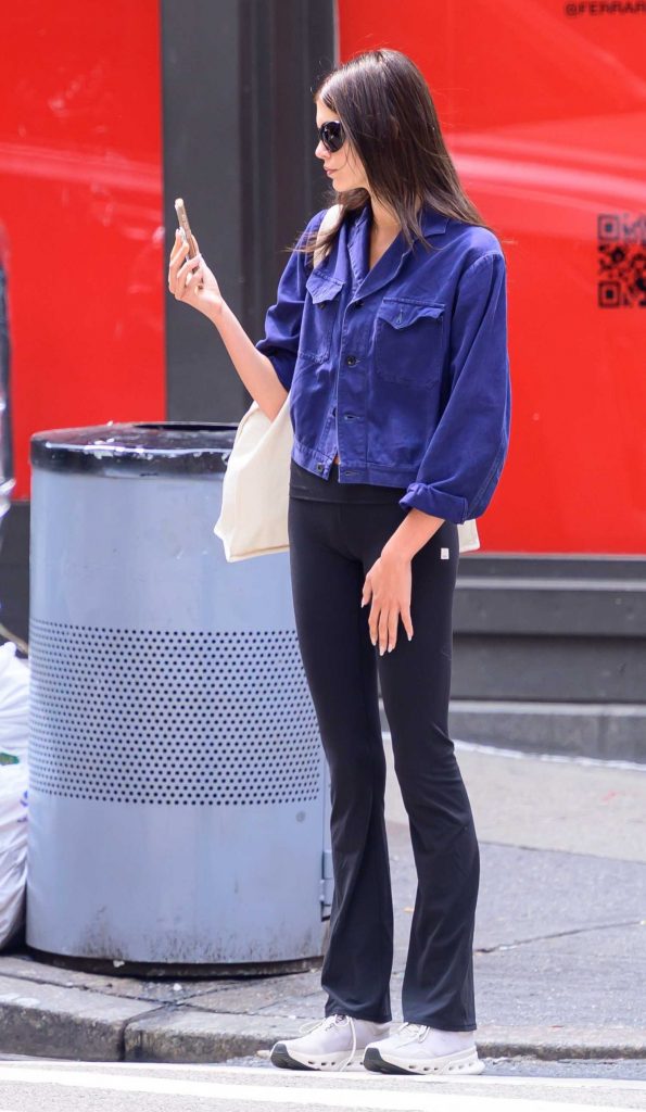 Kaia Gerber in a Blue Denim Jacket