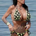 Katie Price in a Black Polka Dot Bikini on the Beach in Ibiza