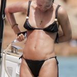 Lila Moss in a Black Bikini on a Yacht in Ibiza
