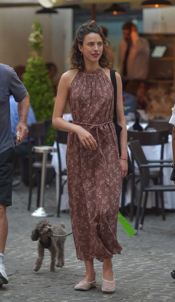 Margaret Qualley in a Brown Floral Dress