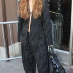 Miley Cyrus in a Black Pinstriped Pantsuit Arrives at Electric Lady Studio in New York