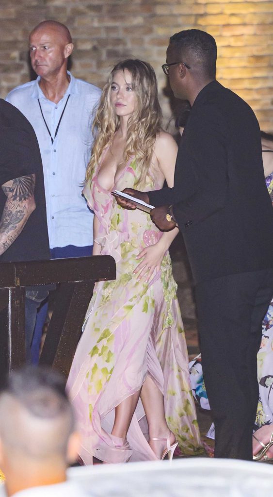 Sydney Sweeney in a Pink Floral Dress