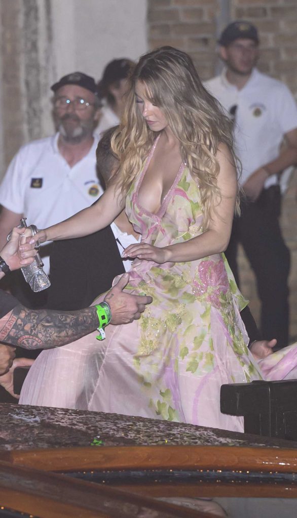 Sydney Sweeney in a Pink Floral Dress