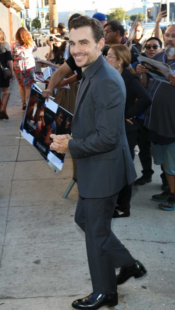 Dave Franco in a Black Pantsuit