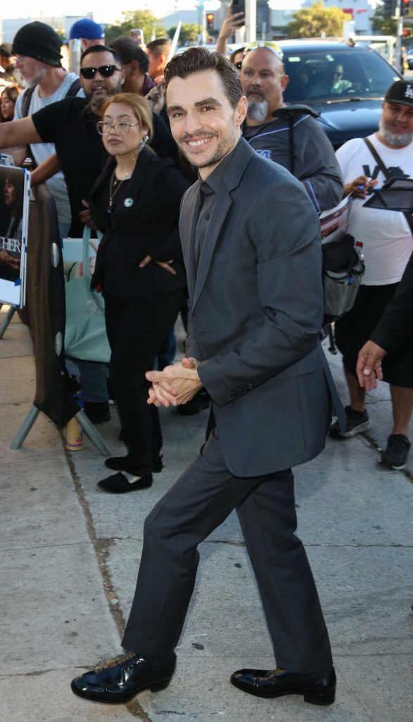 Dave Franco in a Black Pantsuit