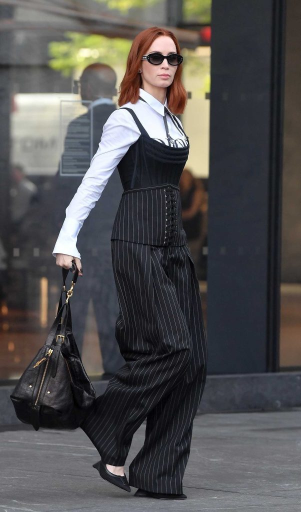 Emily Blunt in a Black Pinstriped Pants