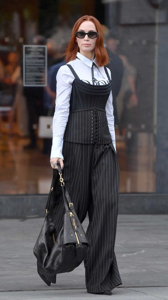 Emily Blunt in a Black Pinstriped Pants
