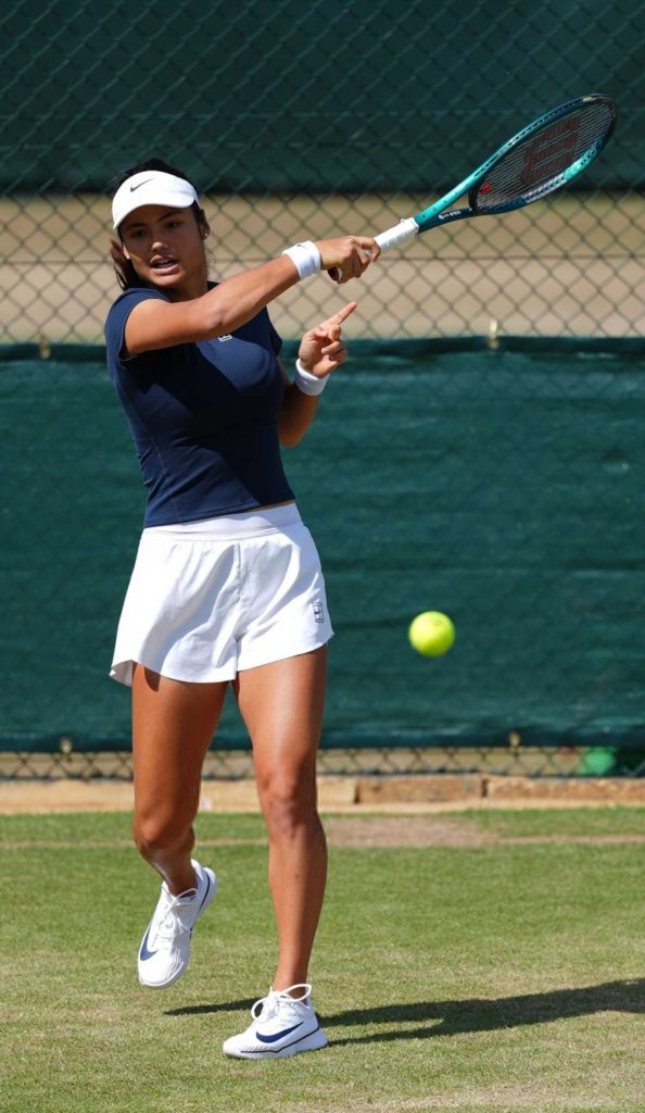 Emma Raducanu in a White Shorts