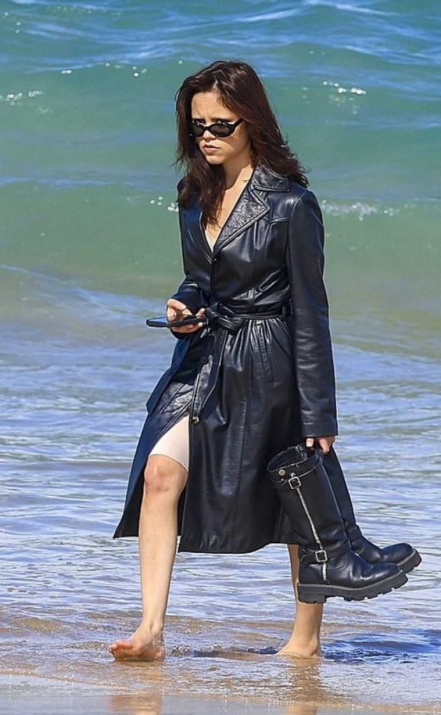 Jenna Ortega in a Black Leather Coat