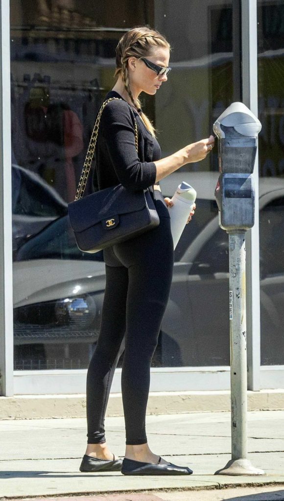 Margot Robbie in a Black Ensemble