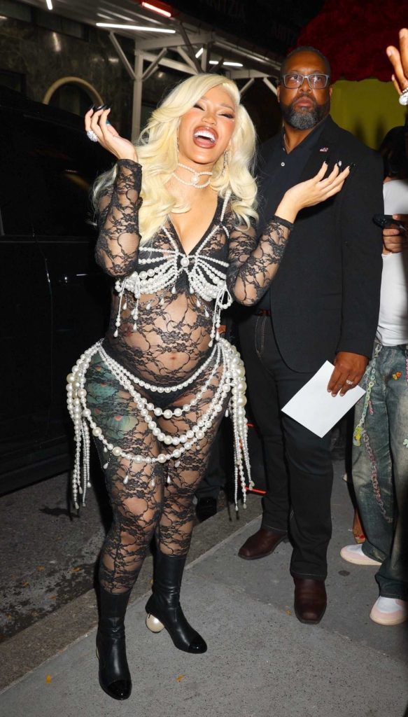 Cardi B in a Black See-Through Catsuit