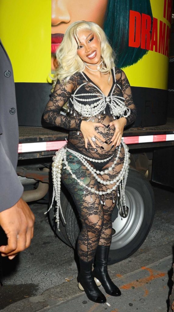 Cardi B in a Black See-Through Catsuit
