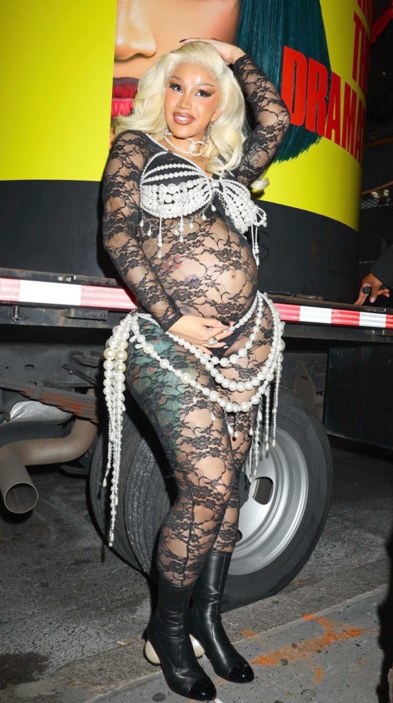 Cardi B in a Black See-Through Catsuit