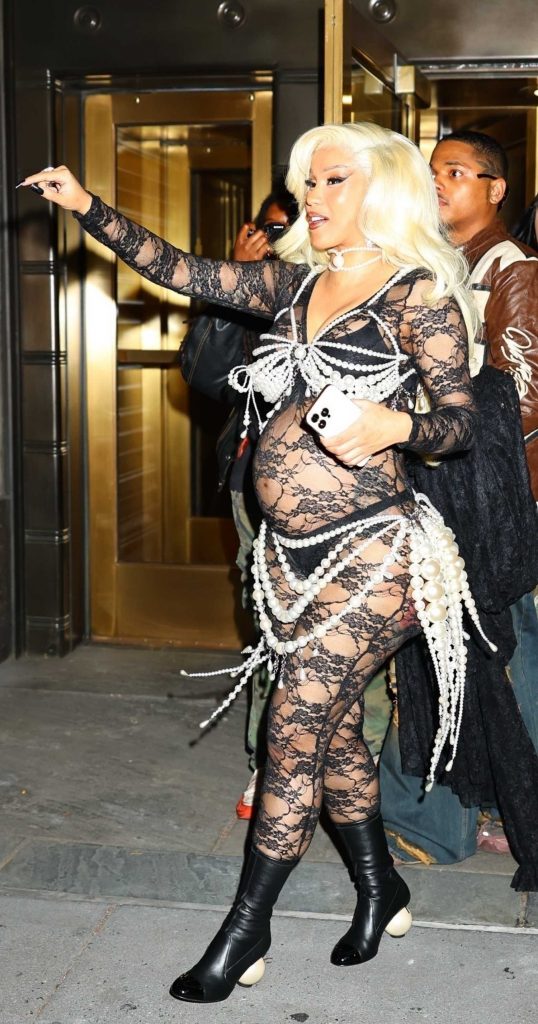 Cardi B in a Black See-Through Catsuit