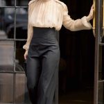 Lily James in a Beige Blouse Leaves Her Hotel in New York