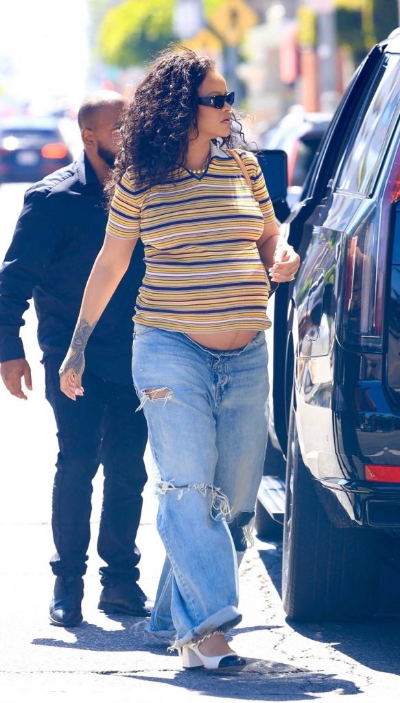 Rihanna in a Blue Ripped Jeans