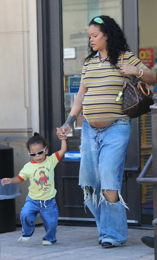 Rihanna in a Blue Ripped Jeans