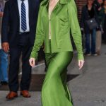 Emma Stone in a Green Ensemble Arrives for The Late Show with Stephen Colbert in New York City