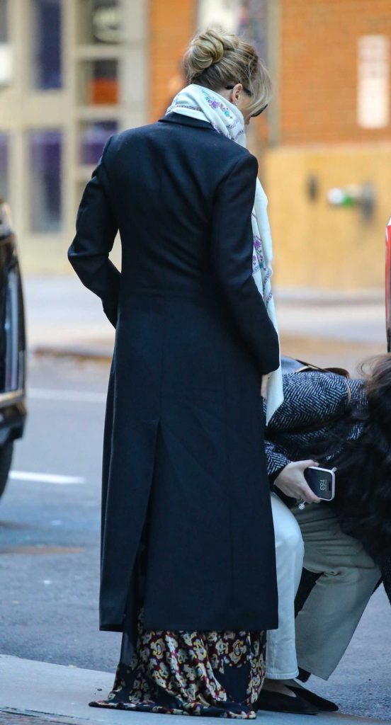 Jennifer Lawrence in a Black Coat
