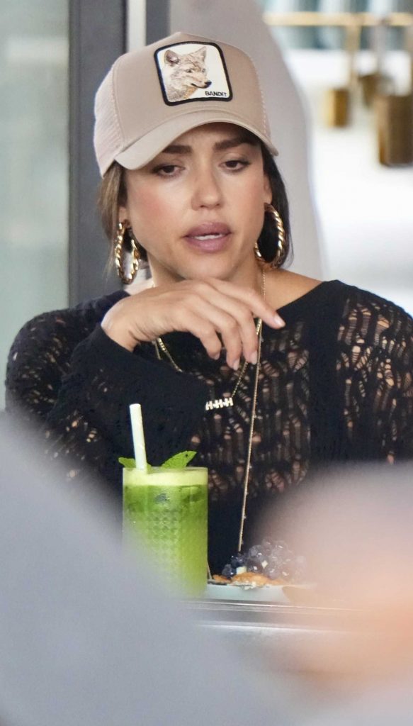 Jessica Alba in a Beige Cap