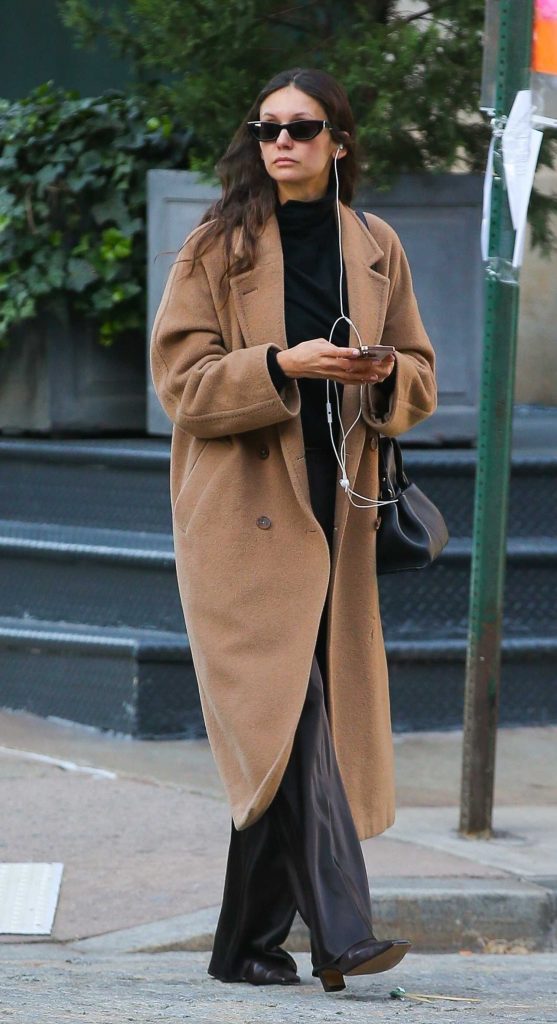 Nina Dobrev in a Beige Coat