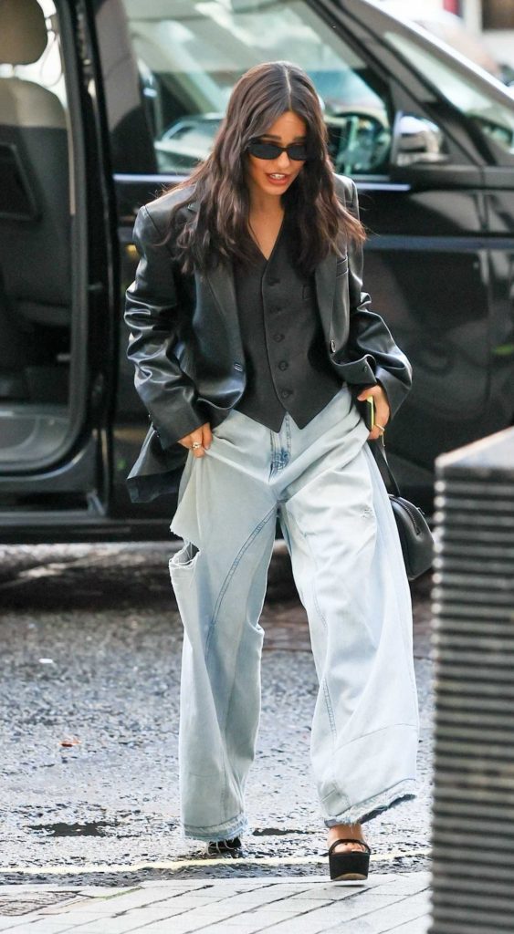 Rachel Zegler in a Black Leather Blazer