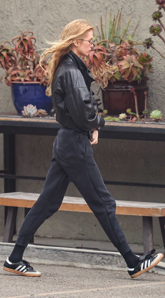 Stella Maxwell in a Black Leather Jacket