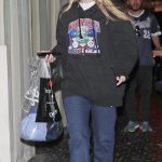 Dakota Fanning in a Black Hoodie Leaves Chateau Marmont in West Hollywood
