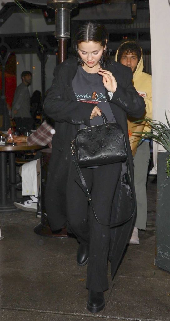 Selena Gomez in a Black Coat