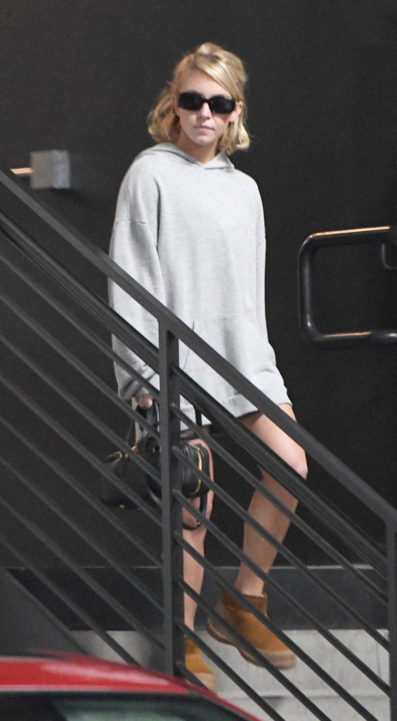 Sydney Sweeney in a Grey Hoodie