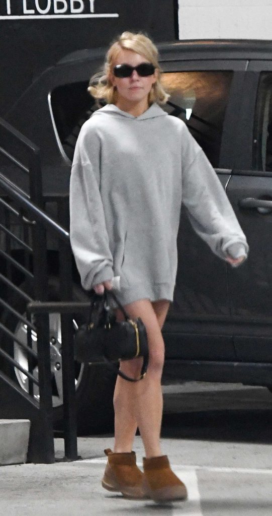 Sydney Sweeney in a Grey Hoodie