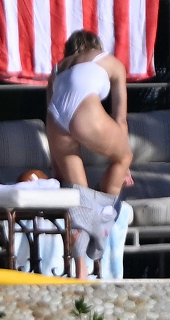 Sydney Sweeney in a White Swimsuit