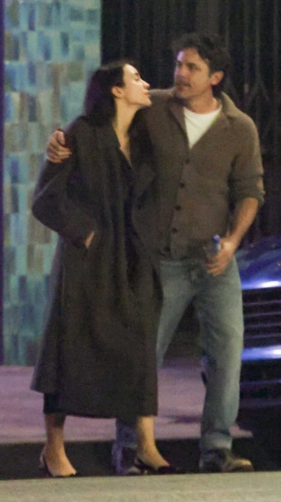 Caylee Cowan in a Black Coat