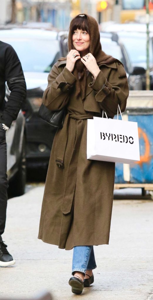 Dakota Johnson in a Brown Coat