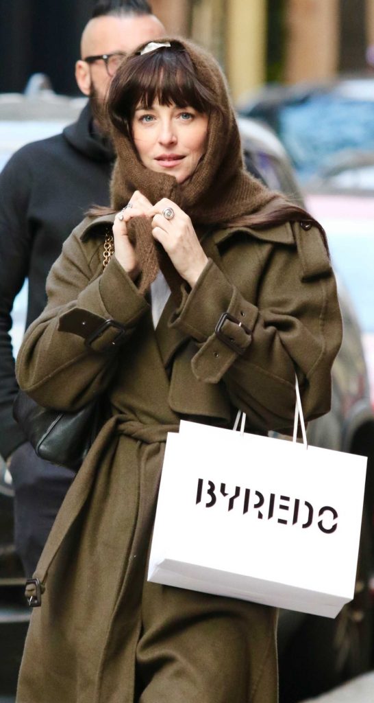 Dakota Johnson in a Brown Coat