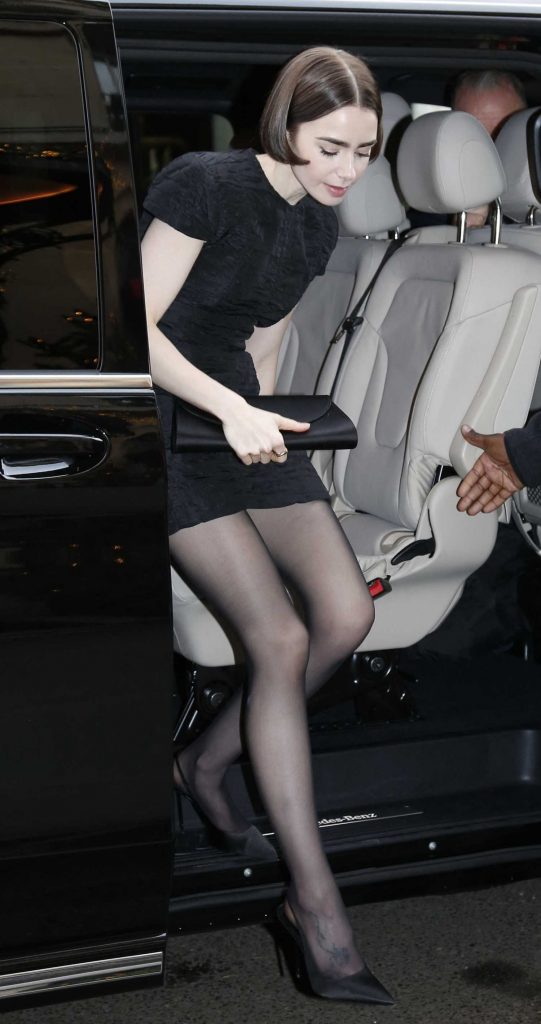 Lily Collins in a Black Dress