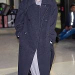 Hilary Duff in a Black Coat Arrives at the Newark Liberty International Airport in New York City