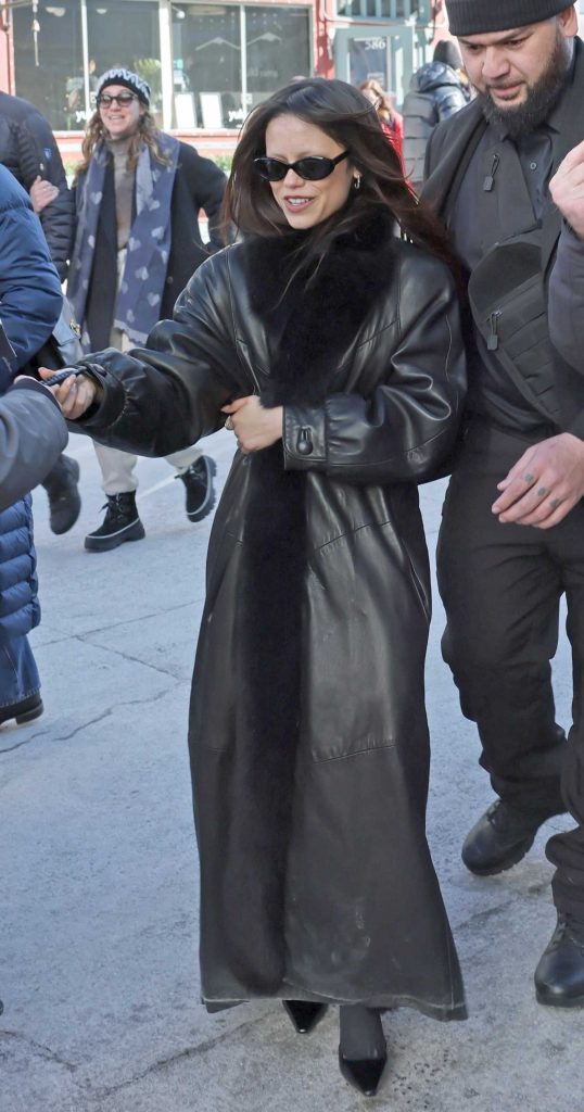 Jenna Ortega in a Black Leather Coat