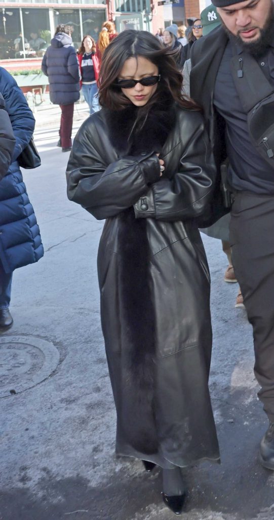 Jenna Ortega in a Black Leather Coat