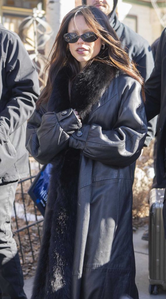 Jenna Ortega in a Black Leather Coat