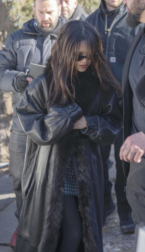 Jenna Ortega in a Black Leather Coat