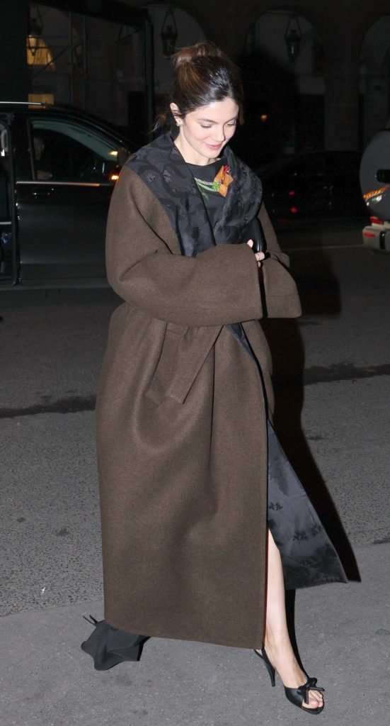 Monica Barbaro in a Brown Coat