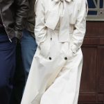Camila Mendes in a White Trench Coat on the Set of Viva La Madness in London