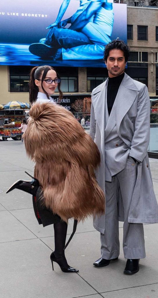 Dove Cameron in a Tan Fur Coat