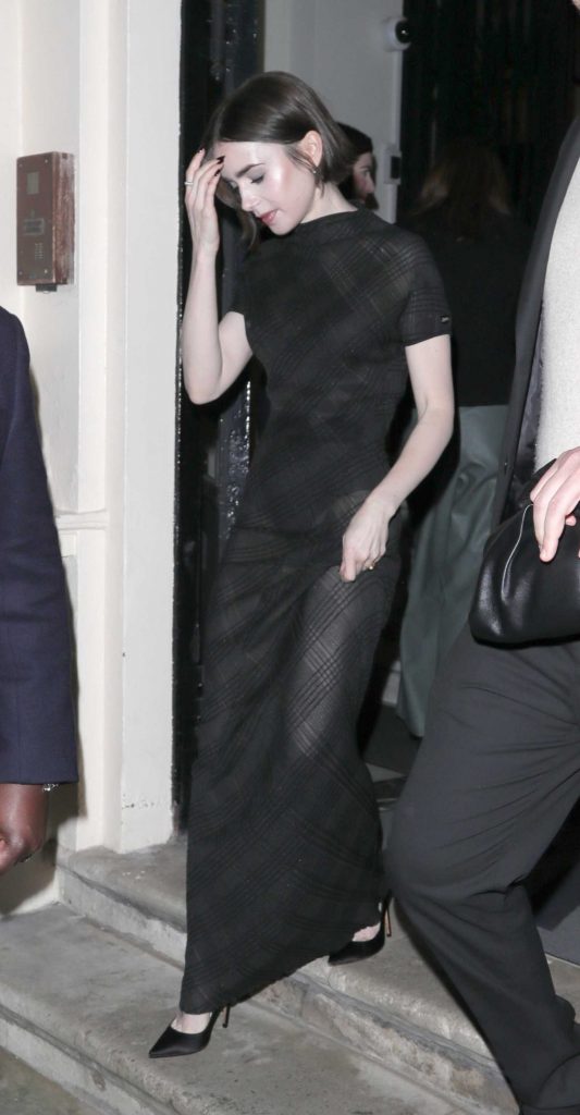 Lily Collins in a Black Dress