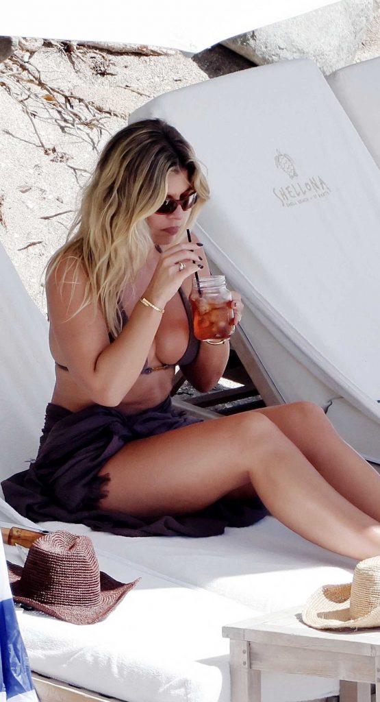 Natasha Oakley in a Brown Bikini