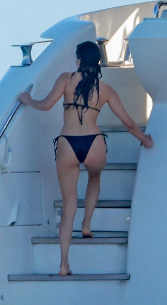 Nina Dobrev in a Black Bikini