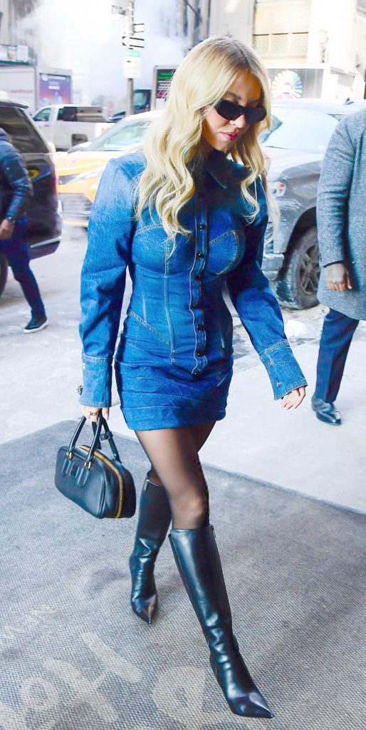 Sydney Sweeney in a Blue Denim Mini Dress