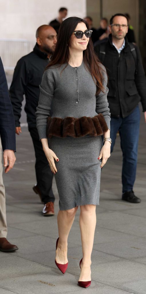 Anne Hathaway in a Grey Ensemble